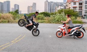 Motorcycle Stunt Ends in a Slam