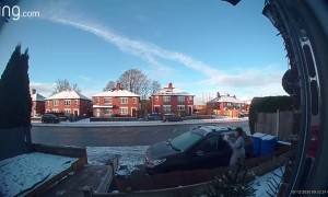 Woman Slips on Slick Driveway