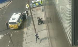 Squad of Officers Apprehend Resistant Man