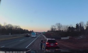 SUV Loses Bumper While Squeezing Between Trucks