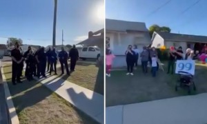 San Diego Police Officers sing 'Happy Birthday' to 99-year-old woman