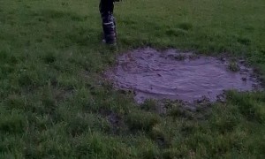 Kid Makes an Unexpected Jump into Mud Puddle