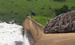 Dog Washed over Dam Wall is Rescued