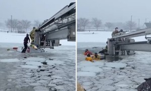 Firefighters rescue two people from submerged truck