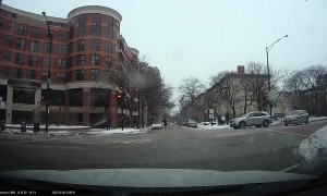 Bicycle Rides Straight Into Car at Icy Intersection