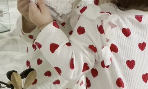 Baby Gives Herself a Kiss in a Mirror