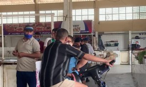 Guy Loses Control of Motor Bike While Showing Off in Meat Market