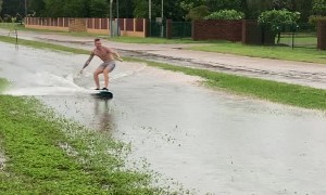 Dudes in Darwin Make the Most of Wet Weather