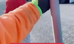 Pedestrian Patiently Waits for Slow Sign