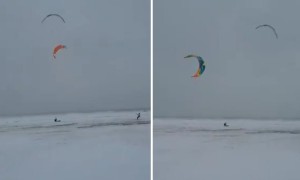 Kite surfing on frozen Lake Michigan during Chicago winter storm