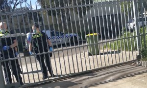 Police Cutting a Padlock on Private Propriety