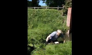Man Trying to Jump Small Stream on Unicycle Prevails