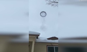 Woman Surprised by Strange Ring of Smoke in the Sky