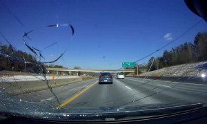 Flying Sheet of Ice Shatters Windshield on Interstate