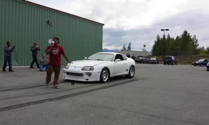 Smoke Clouds Erupt from Sports Car Burnout