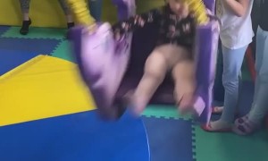 Girl Sent Flying by Swing to the Face