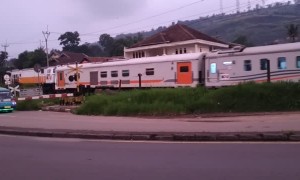 Train Misses Motorcycle by Inches at Level Crossing