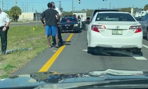 Lady Pulls Pistol on Man at Traffic Altercation