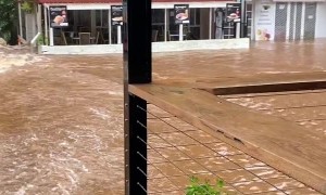 Floods Turn Creek Into Raging Torrent
