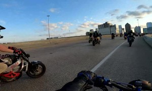 Rider Performing Wheelie Nearly Falls Off Overpass