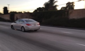 Speeding Car Is Missing A Tire