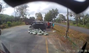 Truck Hauling Load Blows a Tire and Spins Out of Control