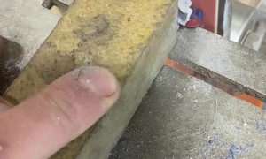 Turning a Nokia 3220 to Dust Using Belt Sander