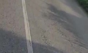Motorcyclist Attempting Wheelie Wrecks
