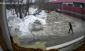 Block of Ice Falls onto Parked Car