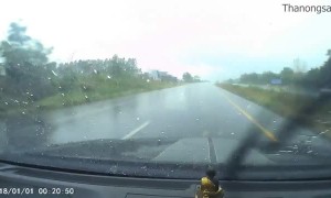 Speeding Truck Hydroplanes across Highway