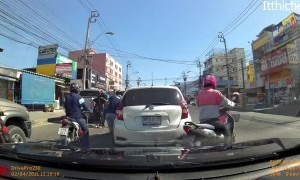 Lane-Splitting Motorcyclist Meets Open Car Door