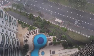 Storm Pushes Water Tank from 24-Story Building