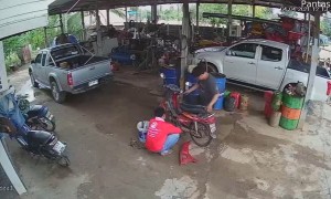 Motorcycle Bursts Into Flames in Mechanic Shop