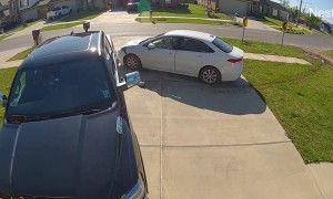 Father Narrowly Escapes Out of Control Car in Driveway