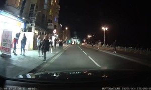 Roadside Scuffle Gets Close to Car