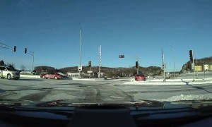 Car in a Hurry Slides Haphazardly Through Intersection