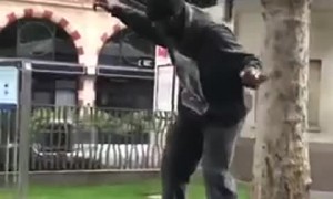 Guy Skating Balances on Four Stacked Skateboards