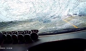 Truck Tire Flings Road Debris through Windshield