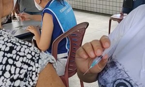 Chair Gives Way While Waiting for Covid Vaccine