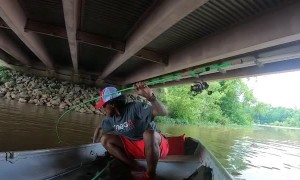 Fisherman Trades The Rod for the Fish