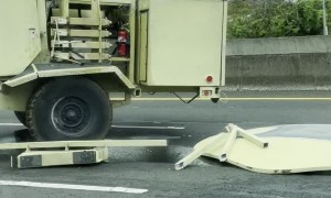 Military Hummer Jackknifes on Highway