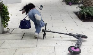 Woman Saves Coffee, Hurts Self