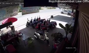 Sliding Car Smashes Through Shop Window