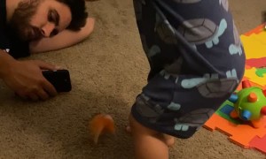 Boy Bonks Dad with Bucket