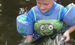Boy Reels in Huge Largemouth Bass