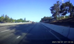 Highway Collision Causes Truck to Overturn