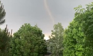 Crazy tornado footage taken right in front of this home