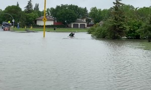 Husband Crosses Flood Kayaking Off Bucket List