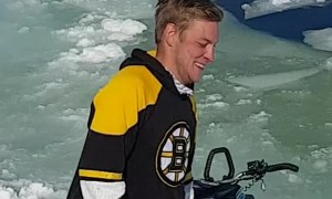 Helicopter Lifts Lost Sled From Lake