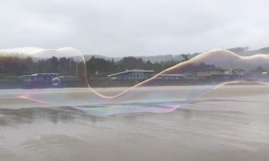 Incredible Giant Bubble Stretches Along Beach
